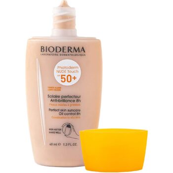 Photoderm Nude Touch Fluid SPF 50+ - Ochranný tónovaný fluid pre zmiešanú až mastnú pleť
